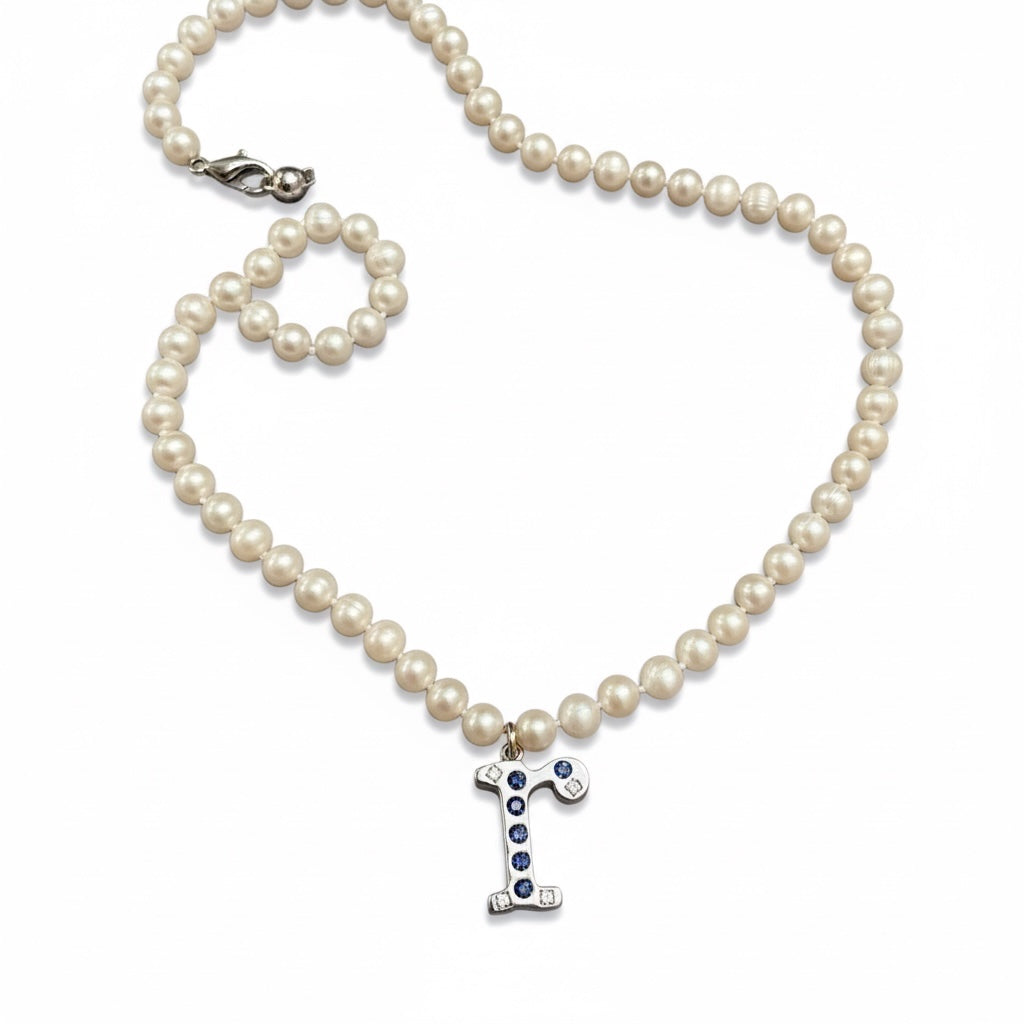 Platinum Pearl and Sapphire R necklace